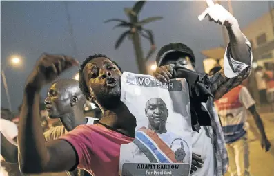  ?? Picture: AFP ?? JUBILATION: People in the Gambian capital, Banjul, celebrate the inaugurati­on this week of President Adama Barrow, who was sworn in at a ceremony in the Gambian embassy in Senegal on Thursday