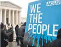  ?? JACQUELYN MARTIN/AP ?? Ohio’s strict voter registrati­on laws drew protests outside the U.S. Supreme Court in January.