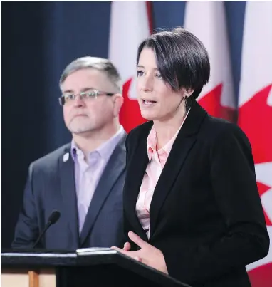  ?? SEAN KILPATRICK / THE CANADIAN PRESS FILES ?? Debi Daviau, right, president of the Profession­al Institute of the Public Service of Canada, says the federal government needs to act fast to replace the troubled Phoenix pay system if it wants to win back public servants’ confidence.