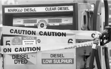  ?? Ted Rhodes / Postmedia News files ?? During these days of plunging gasoline prices, diesel fuel has stubbornly stayed costly.