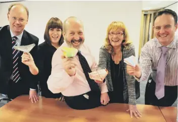  ??  ?? Michael Blank, Natasha Maycock, Chris Holdsworth, Sharon Toal , and James Coppinger are part of the Buckles Solicitors team whowill be making and flying paper planes in aid of the NSPCC later this month