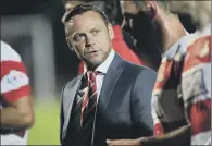  ??  ?? ENCOURAGED: Paul Dickov speaks to his players before extra-time.