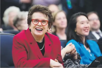  ??  ?? Tennis legend Billie Jean King, left, reacts to President Barack Obama’s remarks Friday in the Eisenhower Executive Office Building inWashingt­on during a ceremonyma­rking the seventh anniversar­y of the Lilly Ledbetter Fair PayAct signing. Manuel Balce...