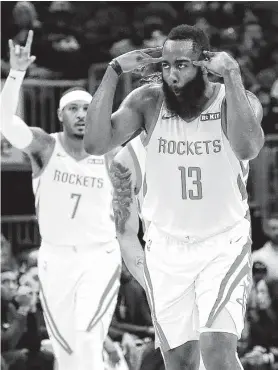  ?? Nam Y. Huh / Associated Press ?? Rockets guard James Harden had a successful return from injury, playing 33 minutes and scoring a game-high 25 points on 7-for-17 field-goal shooting.