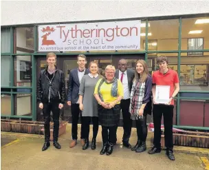  ??  ?? ●● Tytheringt­on School staff and pupils celebrate after being ranked in the top 10 per cent of sixth forms in the country