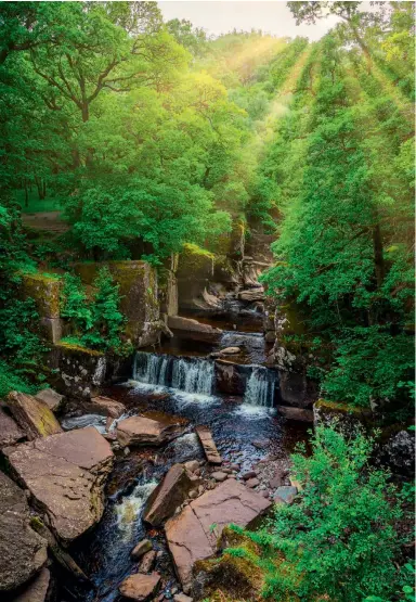  ??  ?? Left: Bracklinn Falls is a spectacula­r hideaway near Callander. Above: Doune Castle, a medieval stronghold near the village of Doune, is well worth a visit. Below: The valley views from Ben A’an, above Loch Katrine, are not to be missed.