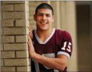  ?? PATRICK RAYCRAFT — HARTFORD COURANT VIA AP ?? In this 2005 photo, Aaron Hernandez poses for a photo in Bristol.