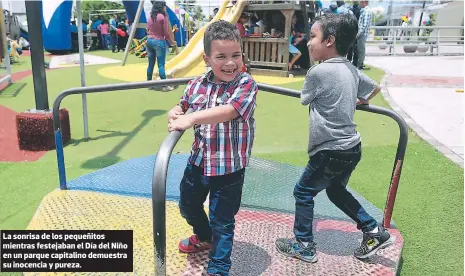  ?? FOTOS: MARVIN SALGADO ?? La sonrisa de los pequeñitos mientras festejaban el Día del Niño en un parque capitalino demuestra su inocencia y pureza.