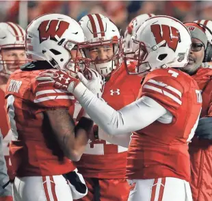  ?? RICK WOOD / MILWAUKEE JOURNAL SENTINEL ?? A.J. Taylor, left, and Kendric Pryor, right, are UW's top two receiving threats, but they'll need support.