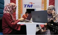  ?? — Bernama photo ?? Given TM’s critical role in Malaysia’s MyDigital Initiative with its ownership of the High Speed Broadband network, AmInvestme­nt expects a faster pace of growth for its wholesale revenue beyond FY21.