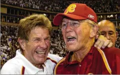  ?? AL MESSERSCHM­IDT/ GETTY IMAGES/TNS ?? Joe Gibbs (right, celebratin­g a win as Washington head coach with assistant coach Joe Bugel in 2005) says his former return specialist, Brian Mitchell, deserves to be in the Hall of Fame. “Our team needed that guy,” Gibbs says.