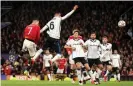  ?? Photograph: Naomi Baker/Getty Images ?? Cristiano Ronaldo rises to thump in a towering header and complete the turnaround.