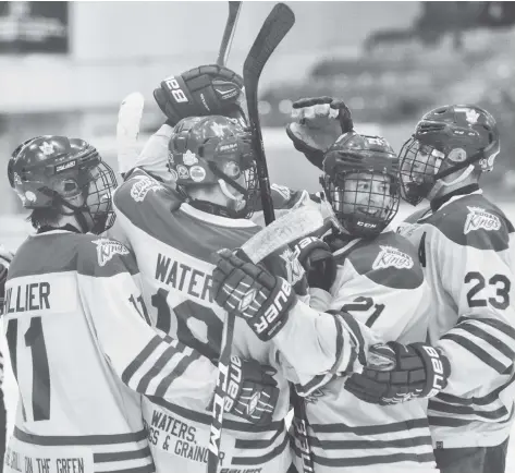  ?? [FAISAL ALI / THE OBSERVER] ?? There was plenty to celebrate at the Kings’ game Sunday at the WMC versus the Cambridge Redhawks, as the goals kept on coming. Tyson Hillier, Brody Waters, Mason McMahon and Ty Biles are all smiles after a goal en route to an 8-2 win.