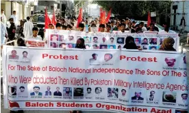  ?? Photograph: Asianet-Pakistan/Alamy ?? Supporters of Balochista­n Students Organizati­on-Azad protesting against kidnapping­s by Pakistani security forces.