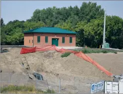  ?? NEWS PHOTO EMMA BENNETT ?? The Balmoral lift station went into operation in late June. Some exterior work is still under constructi­on.