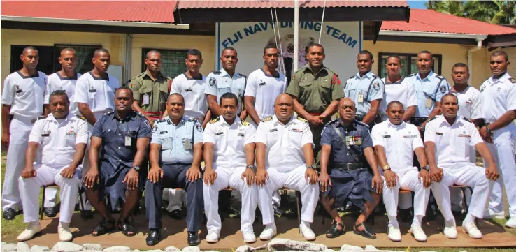  ?? Photo: RFMF Navy ?? The office of the Republic of Fiji Military Forces (RFMF) Navy Captain (Navy) Humphrey Tawake (sitting fifth from left) with the divers at the back.