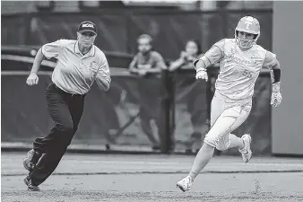  ?? PHOTO BY ALISON P. MCNABB/TENNESSEE ATHLETICS ?? Tennessee shortstop Meghan Gregg, shown rounding the bases during a game last season, went 11-for-16 over five games last weekend in Florida.