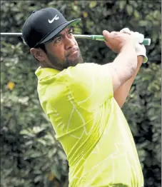  ?? GETTY IMAGES FILE ?? Tony Finau drives on the ninth hole during the second round of the Masters on April 9.