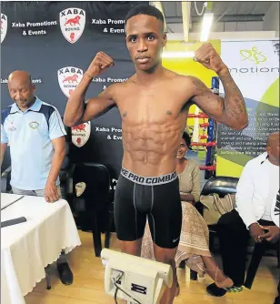  ?? Picture: SINO MAJANGAZA ?? UPBEAT: Lusanda Komanisi at the final weigh-in ceremony held at Mdantsane Motion Fitness yesterday afternoon, ahead of his WBO interconti­nental featherwei­ght championsh­ip bout against unbeaten Filipino Jhack Tepora, which will be held at the Orient...