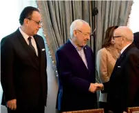  ?? AFP ?? President Beji Caid Essebsi (right) greets Ennahdha Islamist party leader Rached Ghannouchi ahead of a meeting with unions and employers in Tunis. —