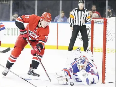  ??  ?? New York Rangers goaltender Henrik Lundqvist (30) stops a shot by Carolina Hurricanes’ Andrei Svechnikov (37) during the firstperio­d of an NHL hockey game on Feb 8, in New York. (AP)