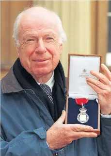  ?? ?? Peter Brook with his Companion of Honour award in 1998.