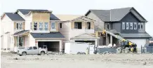  ?? WIL ANDRUSCHAK/ HERALD ?? Constructi­on starts on single-family homes in the Calgary area continue to pick up from the same time in 2016.