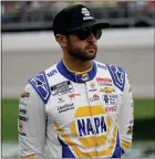  ?? PAUL SANCYA — THE ASSOCIATED PRESS ?? Chase Elliott looks on before a NASCAR Cup Series at Michigan Internatio­nal Speedway in Brooklyn, Mich. earlier this month.