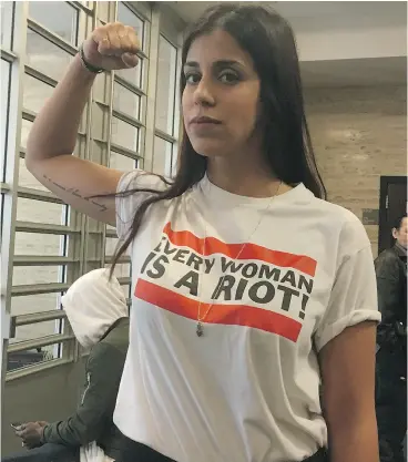  ?? GRAEME HAMILTON / POSTMEDIA NEWS ?? Neda Topaloski outside the courtroom on Tuesday after her acquittal on criminal charges related to a 2015 topless protest at a Grand Prix festival.