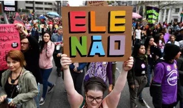  ?? — AFP photo ?? File photo shows demonstrat­ors taking part in a women protest against Bolsonaro called by a social media campaign under the hashtag #EleNao (Not Him) in Sao Paulo, Brazil.