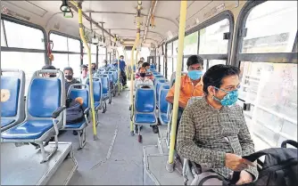  ?? AJAY AGGARWAL /HT PHOTO ?? Social distancing on DTC buses could be seen on Tuesday, with them only allowing 20 passengers to board at a time. n