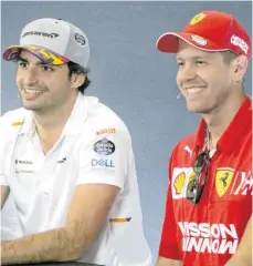  ?? FOTO: HASAN BRATIC/IMAGO IMAGES ?? Vorgänger und Nachfolger? Carlos Sainz (li.) könnte den Platz von Sebastian Vettel bei Ferrari übernehmen.