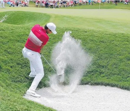  ??  ?? Jason Day in trouble in a bunker during the Players Championsh­ip in Florida. Picture: GETTY IMAGES