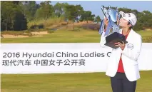  ?? Courtesy of KLPGA ?? Kim Hyo-joo poses after winning the Hyundai China Ladies Open last year. She also won the event in 2012 and 2014.
