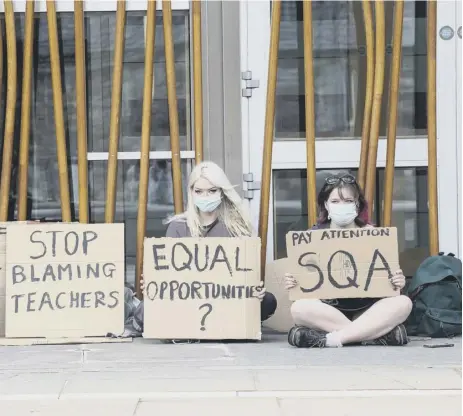  ??  ?? 0 Students protest outside the Scottish Parliament earlier this month about issues with this year’s exams