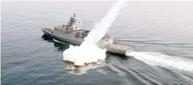  ??  ?? In this photo provided by South Korea Defence Ministry, a South Korean navy ship fires a missile during a drill in South Korea’s East Sea on Thursday, July 6. South Korean warplanes and navy ships have fired a barrage of missiles into the waters during...