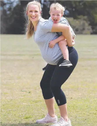  ?? Picture: ANNETTE DEW ?? JUST MOVE: Exercise physiologi­st Kassia Beetham, who is 36 weeks pregnant, with her son Rex Beetham, 3, studied the impact of vigorous exercise in the third trimester.