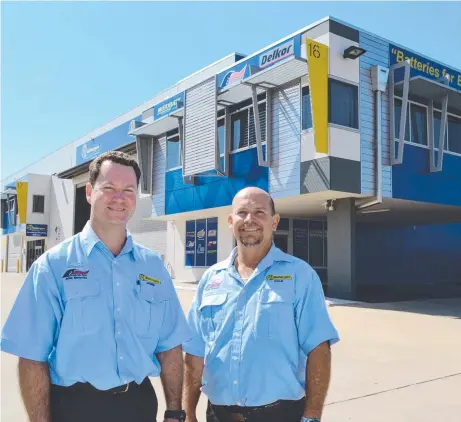  ??  ?? NEW HOME: A1 Batterypro director James Heel and Townsville sales representa­tive Dale Grady at their premises in Mount Louisa.