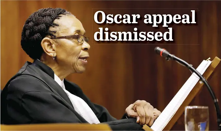  ?? Picture: Reuters/Themba Hadebe/Pool ?? AS YOU WERE. Judge Thokozile Masipa reads her verdict during an appeal hearing brought by prosecutor­s against the six-year jail term handed to Oscar Pistorius for the murder of his girlfriend Reeva Steenkamp on Valentine’s Day in 2013.