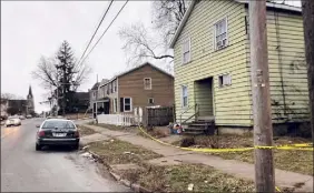  ?? Times Union archive ?? Christophe­r Kitto shot a man several times in the chest during an attempted robbery at this building at Lincoln Avenue in Utica, police said.