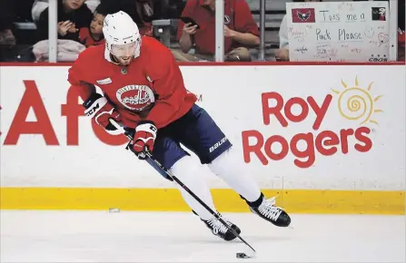  ?? PABLO MARTINEZ MONSIVAIS THE ASSOCIATED PRESS ?? Washington Capitals centre Evgeny Kuznetsov practises in Arlington, Va., on Friday. Game 3 of the National Hockey League’s Stanley Cup final against the Vegas Golden Knights is scheduled for Saturday and the Capitals are still unsure whether Kuznetsov...