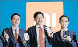  ?? KIN CHEUNG / AP ?? Chew Shouzi (vicepresid­ente), Lei (consejero delegado) y Lin (presidente)