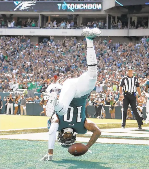  ?? MATT ROURKE/AP ?? The Eagles’ DeSean Jackson celebrates after making a touchdown catch in Sunday’s win. The Eagles outscored the Redskins 25-7 in the second half.