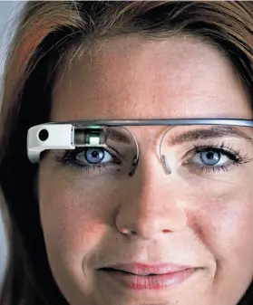  ?? Russell Yip / The Chronicle ?? Rackspace will award $10,000 to the app developer with the best idea for Google Glass, being modeled here by industrial designer Isabelle Olsson.