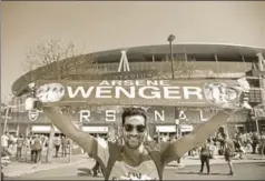  ?? REUTERS ?? An Arsenal fan with a scarf featuring manager Arsene Wenger before the Premier League match between Arsenal and West Ham United, Emirates Stadium, London, April 22