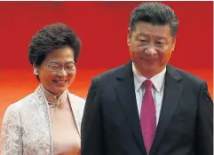  ?? PHOTO: REUTERS ?? One China? Hong Kong chief executive Carrie Lam and Chinese President Xi Jinping are pictured together in this 2017 file photograph.