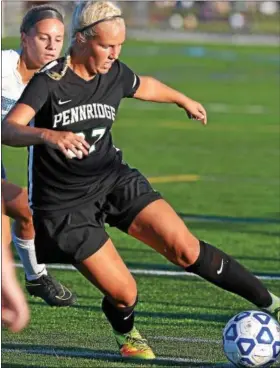  ?? BOB RAINES — DIGITAL FIRST MEDIA ?? Pennridge’s Savanna Harrison turns the ball upfield Tuesday against North Penn.