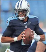  ?? CHRISTOPHE­R HANEWINCKE­L, USA TODAY SPORTS ?? Marcus Mariota completed 70% of his passes.