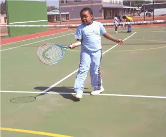  ??  ?? A student from Wonder Christian Junior College, Takunda Mandishona during a tennis lesson