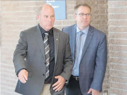  ?? RYAN REMIORZ/THE CANADIAN PRESS ?? Train driver Thomas Harding, left, on the first day of the Lac-Mégantic trial in Sherbrooke, Monday.